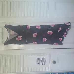 Beautiful flirty asymmetrical crossover bust, empire waist dress.